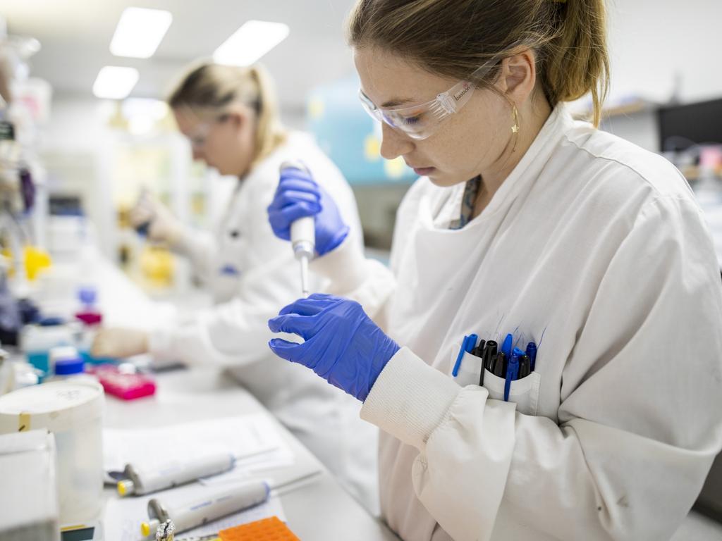 Researchers at the University of Queensland pictured working on a COVID-19 vaccine last year. It was abandoned after the jab was found to produce false-positive readings to HIV. Picture: The University of Queensland