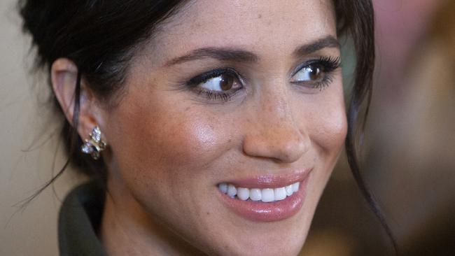 Meghan wearing a pair of butterfly earrings that belonged to Princess Diana. Picture: Steve Christo / POOL / AFP