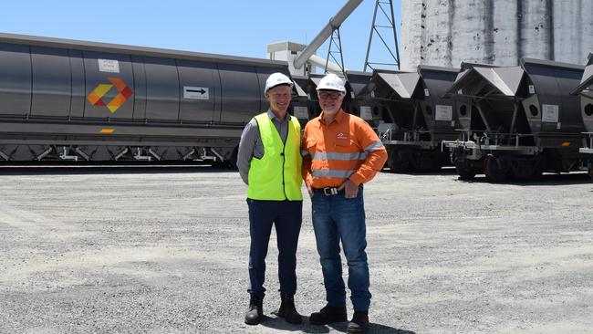 DELIVERY: North Queensland Bulk Ports Corporation general manager of trade and marine operations, Brendan Webb, and Aurizon coal group executive Edward McKeiver with the coal haulage wagons at the Port of Mackay. Picture: Melanie Whiting