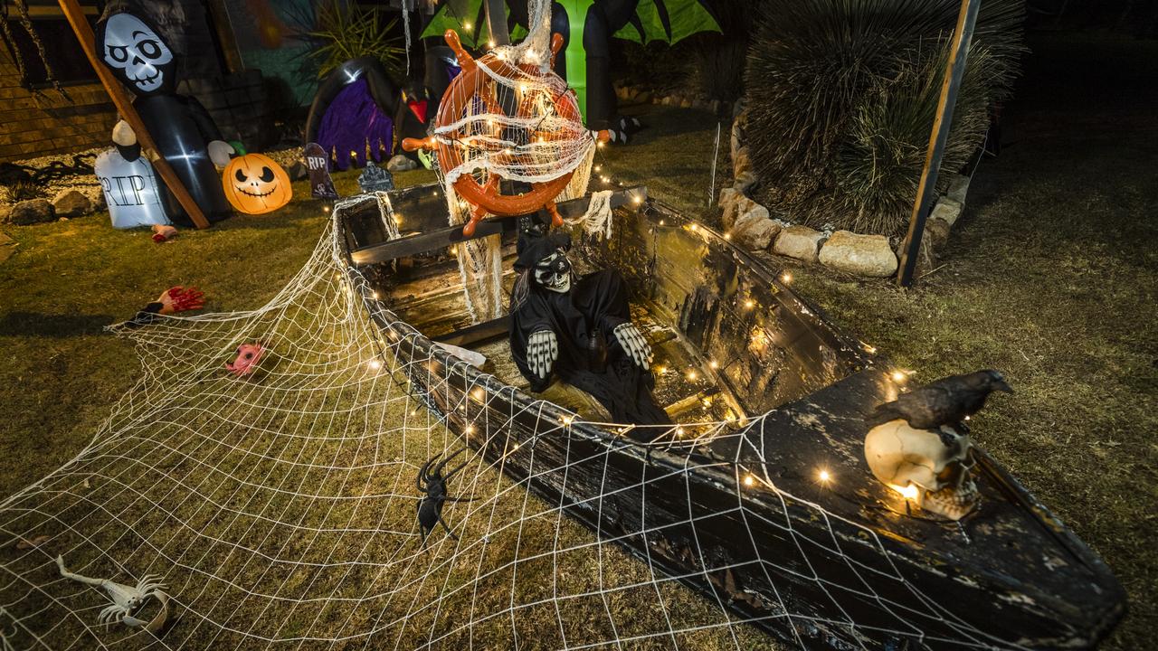 The Martin family Wilsonton Heights Halloween scare house features a boat that Danielle went fishing with her father in when she was a child. Picture: Kevin Farmer