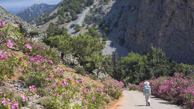 A hiker at the mouth of Samarian Gorge in Crete. Picture: Getty Images