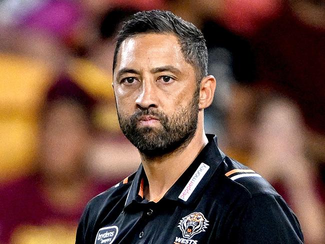 BRISBANE, AUSTRALIA - APRIL 01: Assistant Coach Benji Marshall of the Tigers watches on during the warm up before the round five NRL match between Brisbane Broncos and Wests Tigers at Suncorp Stadium on April 01, 2023 in Brisbane, Australia. (Photo by Bradley Kanaris/Getty Images)