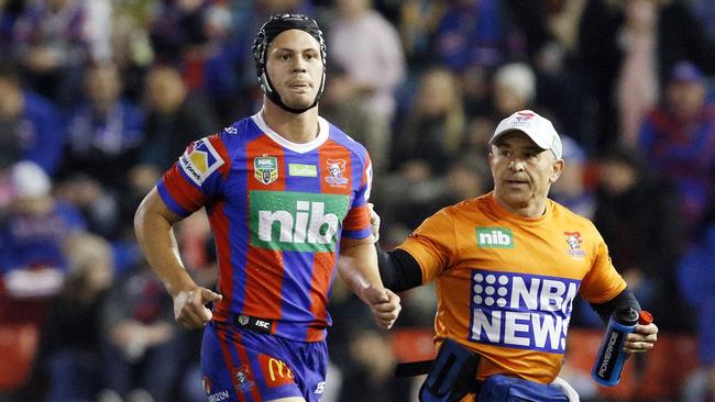 Kalyn Ponga of the Knights leaves the field with a hamstring injury during the Round 16 NRL match between the Newcastle Knights and the Canterbury-Bankstown Bulldogs at McDonald Jones Stadium in Newcastle, Saturday, June 30, 2018. (AAP Image/Darren Pateman) NO ARCHIVING, EDITORIAL USE ONLY