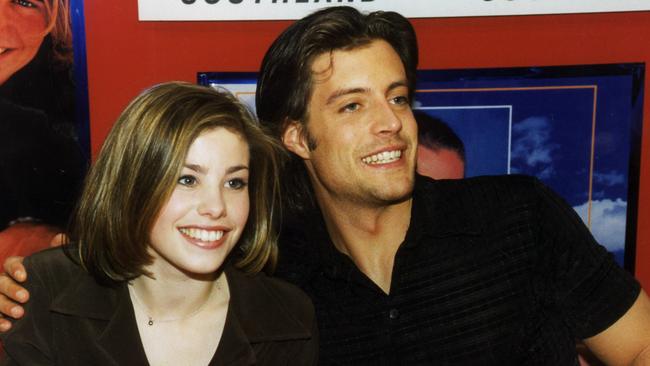 Almost a decade later the soap was still a hit and a new breed of young stars Brooke Satchwell and Dan Paris drew crowds to an autograph signing session at in July, 1998.