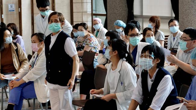 Medical personnel wait for the Moderna vaccine at Taipei Tzu Chi Hospital in New Taipei City, Taiwan. Picture: AFP