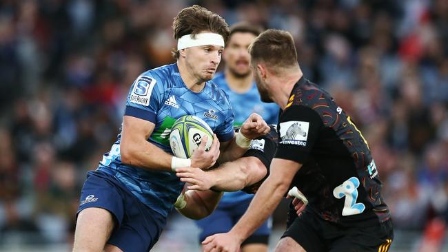 Blues playmaker Beauden Barrett charges into the Chiefs defence. Super Rugby Aotearoa has been played at a ferocious speed Picture: Getty Images