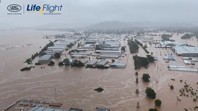 The Land Rover LifeFlight Special Mission helicopter carried out numerous winches and flood rescues in Lismore on Monday morning. Picture Landrover Lifeflight