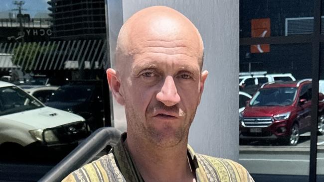 Dale Hipper being marched to the Maroochydore Watch-house after being jailed in Maroochydore Magistrates Court on January 31. Picture: Sam Turner