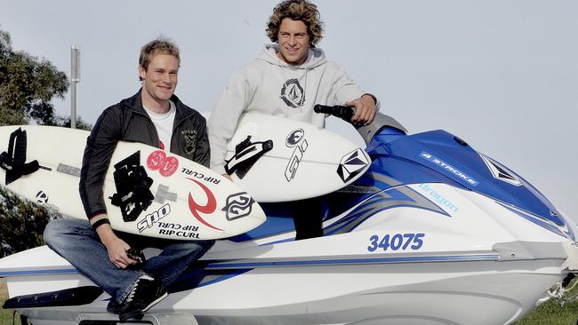 Surfers James Hollmer Cross and Marti Paradisis with a jetski and surfboards in 2006. Picture: Tony Palmer