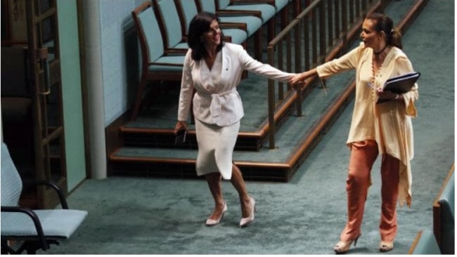 Former Liberal, and now crossbencher, Julia Banks and Labor’s Anne Aly in parliament yesterday. Picture: Gary Ramage