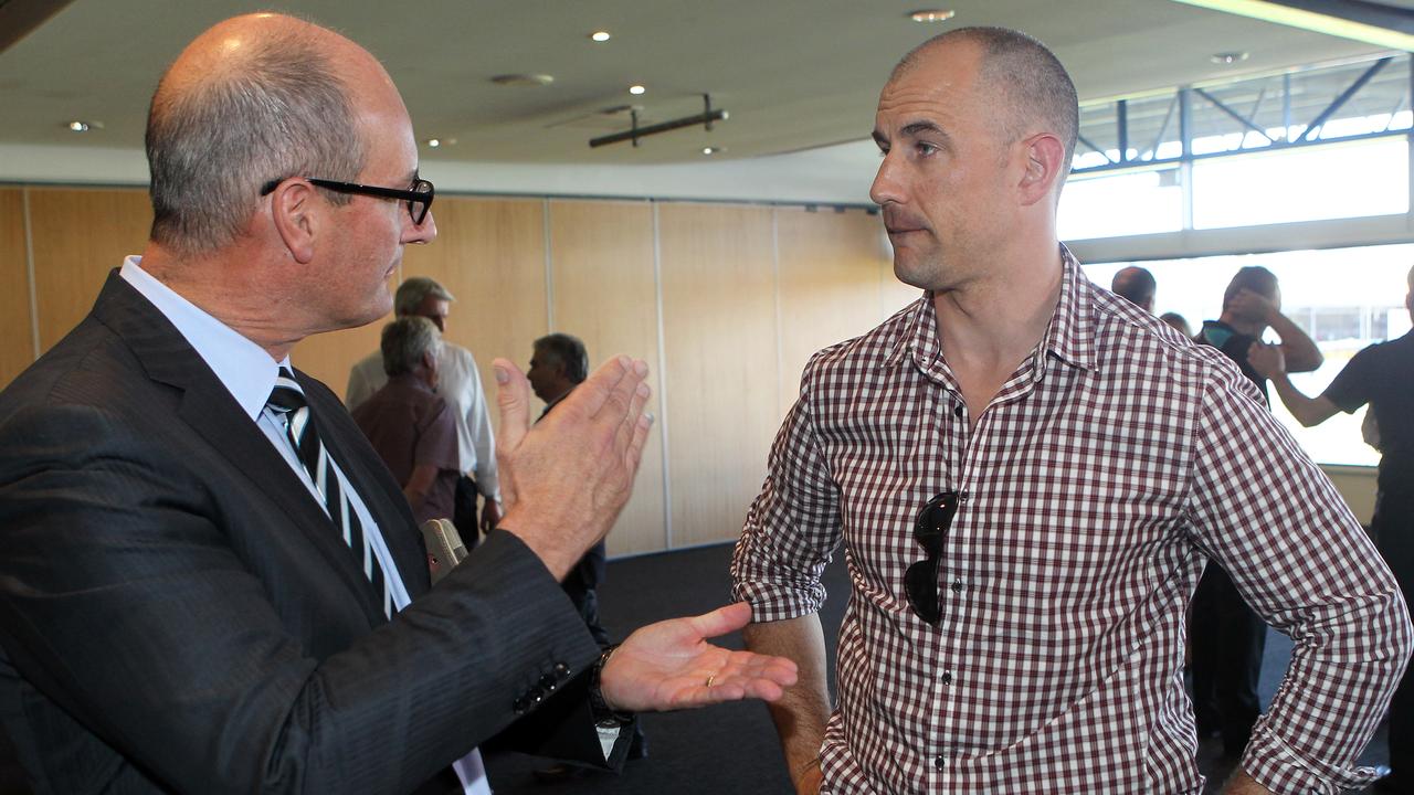 Warren Tredrea talking to Port Adelaide chairman David Koch in 2012. Picture: Simon Cross