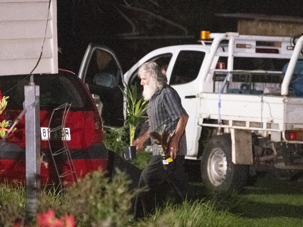 A man believed to be the father of Joel Cauchi arrives at the family home in Toowoomba on Sunday night.