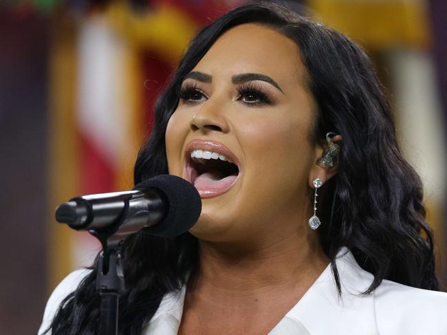 All in! Demi Lovato at the Super Bowl. Picture: AFP