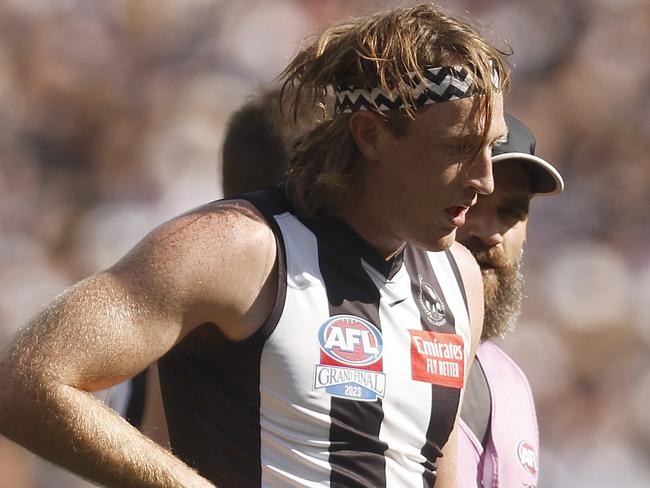 MELBOURNE, AUSTRALIA – SEPTEMBER 30: Nathan Murphy of the Magpies leaves the field with trainers during the 2023 AFL Grand Final match between Collingwood Magpies and Brisbane Lions at Melbourne Cricket Ground, on September 30, 2023, in Melbourne, Australia. (Photo by Daniel Pockett/AFL Photos/via Getty Images)