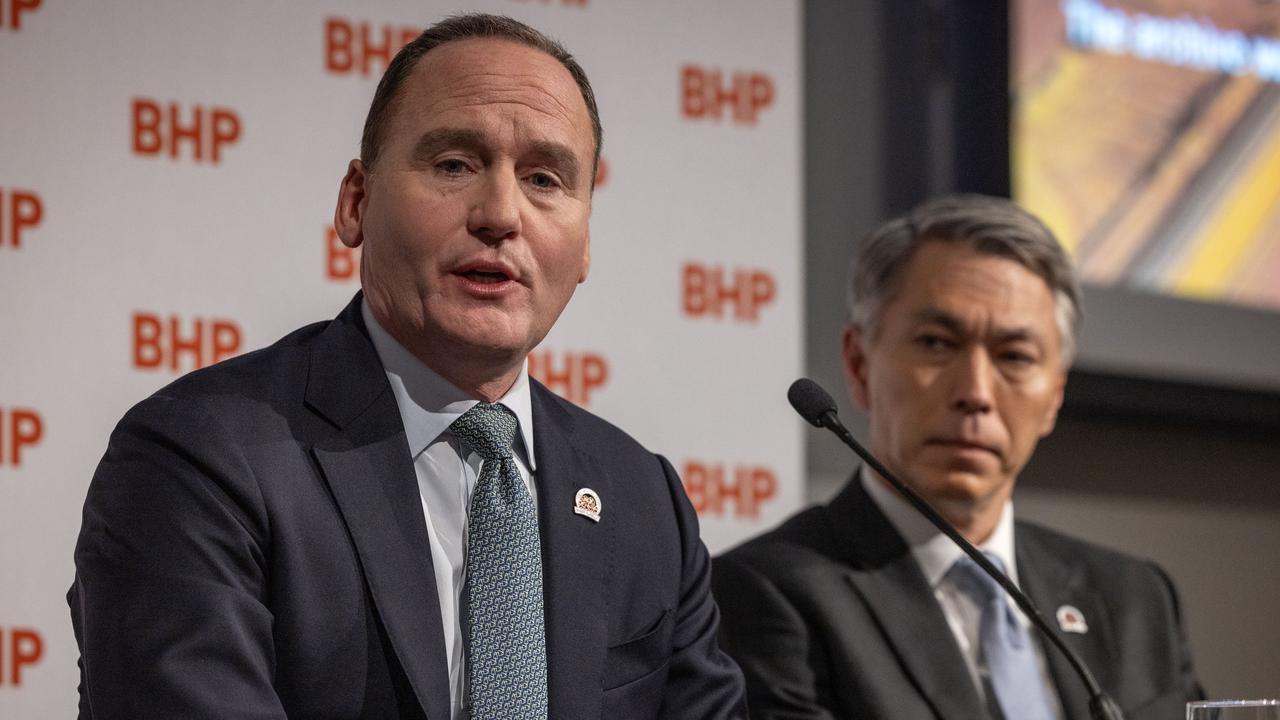 BHP chairman Ken MacKenzie and chief executive Mike Henry face the music at the company’s annual shareholder meeting. Picture: NCA NewsWire / Emma Brasier