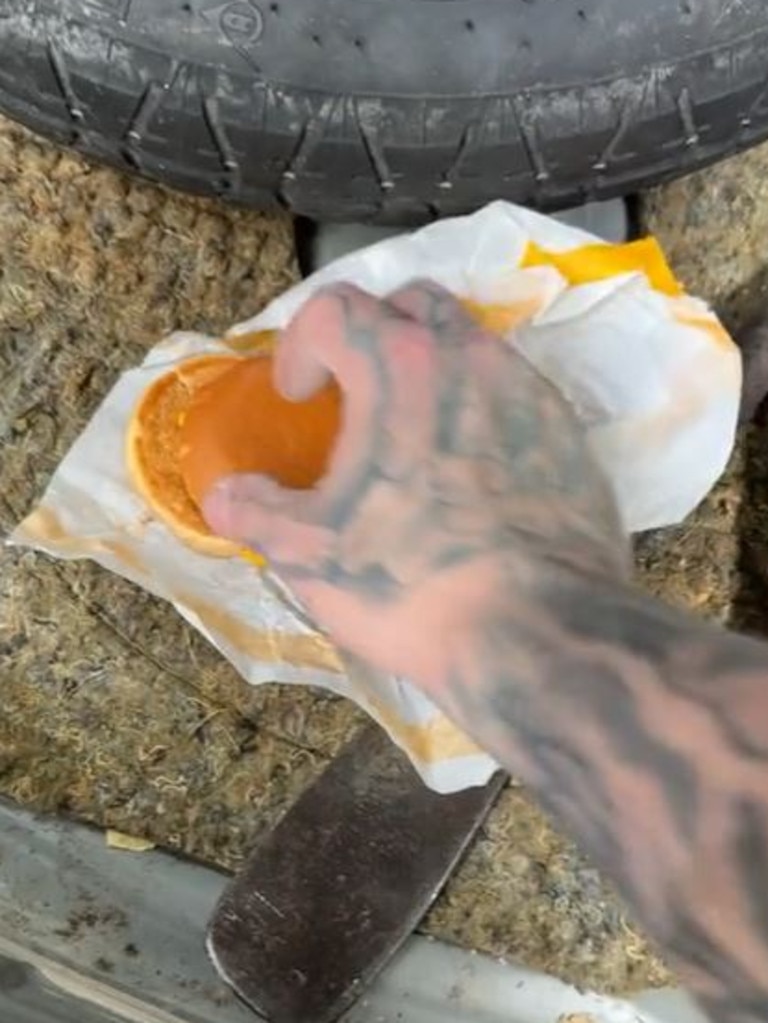 This Maccas burger was found in the boot. Picture: TikTok/whats_the_issue