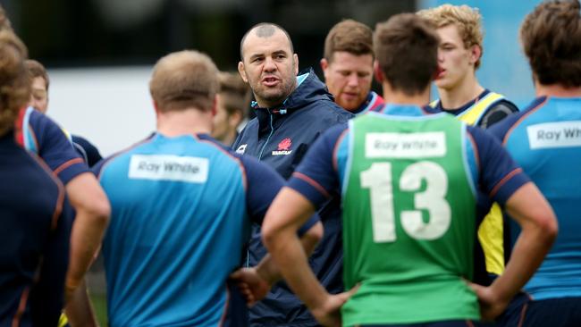 Michael Cheika talks to his team during Waratahs training at Kippax Oval,Moore Park.Picture Gregg Porteous