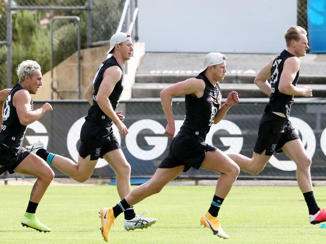 Port Adelaide’s Boyd Woodcock, Todd Marshall, Xavier Duursma and Sam Hayes are put through their paces. Picture: Sarah Reed