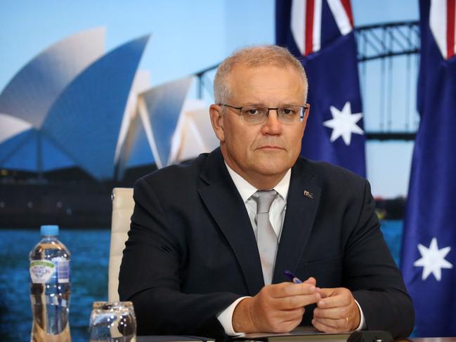 SYDNEY, AUSTRALIA - NewsWire Photos APRIL 22, 2021 - Prime Minister Scott Morrison listens to President BidenÃs virtual address from the Sydney Commonwealth Parliament Offices.Picture: NCA NewsWire / Christian Gilles