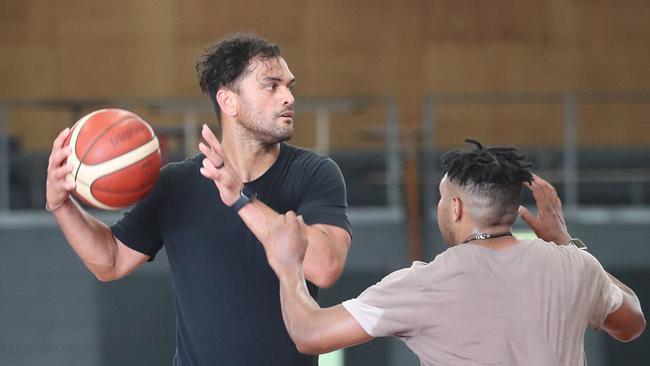 Karmichael Hunt has been spending some of his spare time playing basketball with troubled young people. Picture: Peter Wallis.