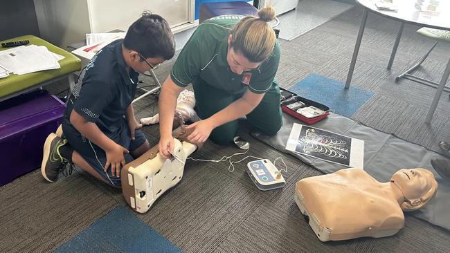 Larrakeyah Primary School's Year 5 and 6 students learn CPR with paramedics through the Quest program. Picture: Larrakeyah Primary School