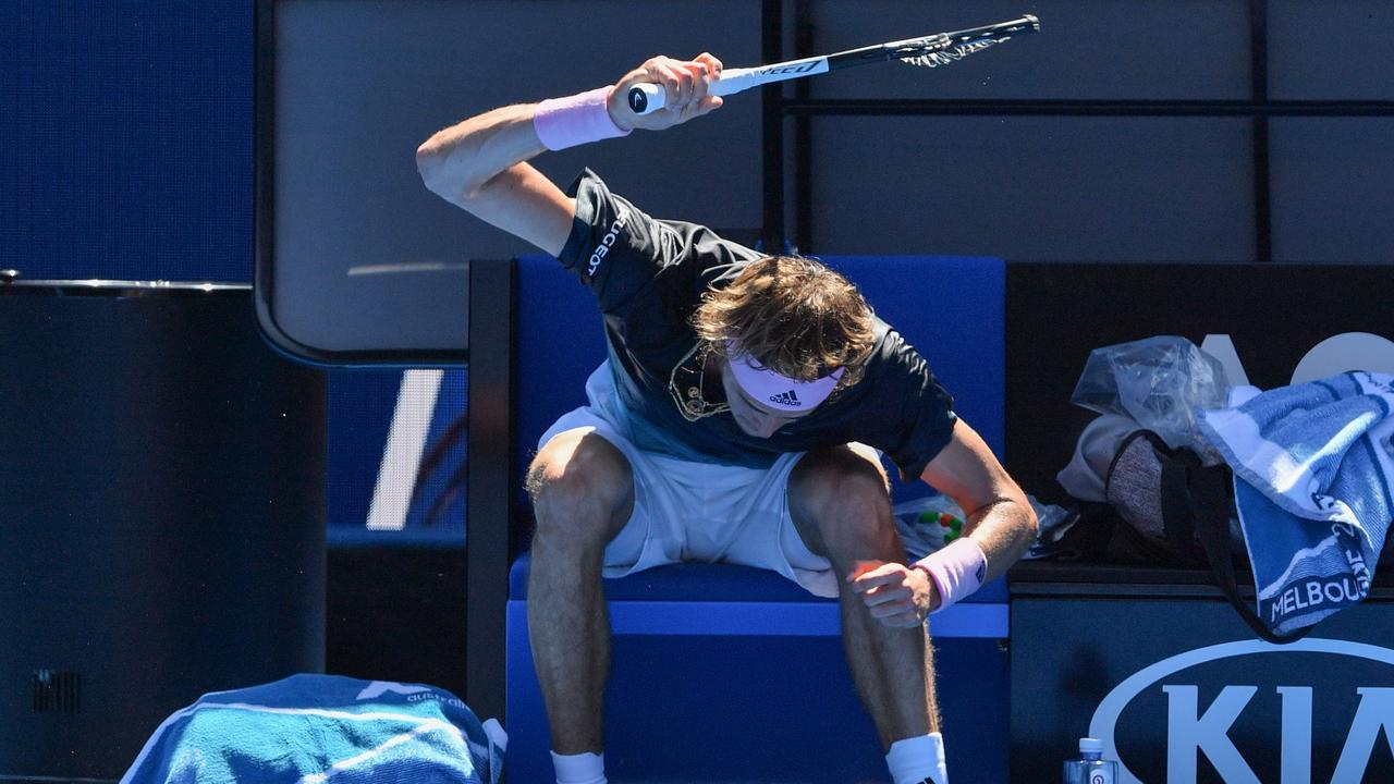 Germany's Alexander Zverev smashes his racquet. Photo: Paul Crock / AFP