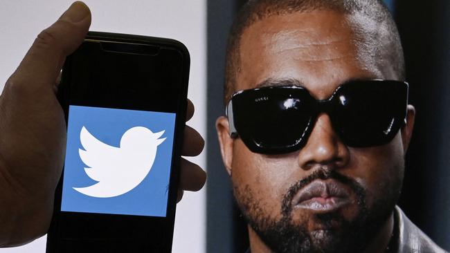 Kanye West was knocked off social media platform Twitter on Friday, Elon Musk said, after posting a picture that appeared to show a swastika interlaced with a Star of David. "Just clarifying that his account is being suspended for incitement to violence," Musk said in response to West's tweet. (Photo by OLIVIER DOULIERY / AFP)