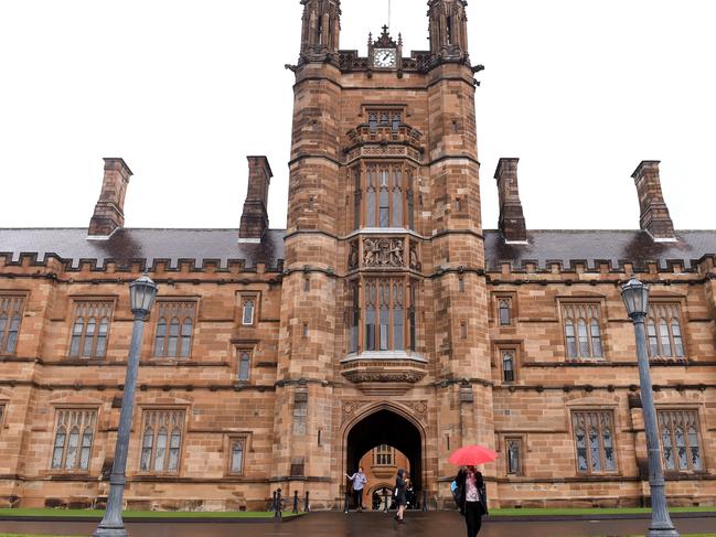 Students walk from the quadrangle at the University of Sydney, in Sydney on Thursday, Sept. 22, 2016. Australia's universities continue to perform strongly on a global level, with eight universities among the top 200 and 35 of its 43 universities make the list, all within the top 800, but the latest rankings offer a warning about the rise of Asian institutions. (AAP Image/Paul Miller) NO ARCHIVING