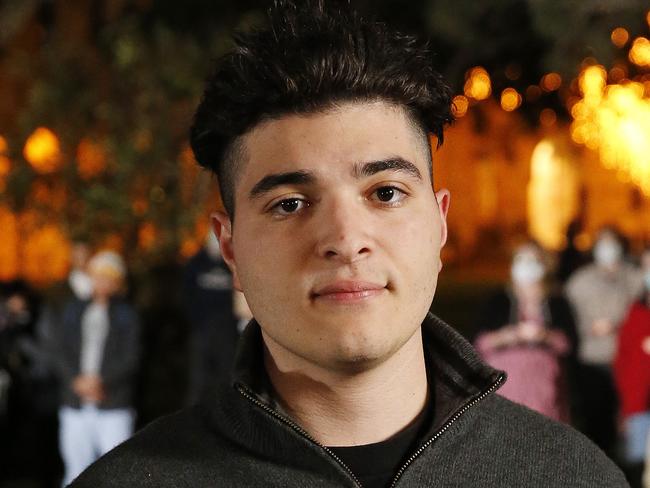 Drew Pavlou pictured holding a candlelight vigil to the 31st anniversary of the Tinanmen Square Massacre at University of Queensland, Brisbane 4th of June 2020.   (AAP Image/Josh Woning)