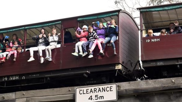 After a four year ban, passengers are allowed to dangle their legs out of Puffing Billy’s windows again.