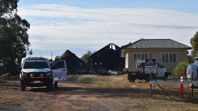 Fire and police investigators at the scene on Friday morning working to determine the cause of the blaze. Picture: Chloe Cufflin.