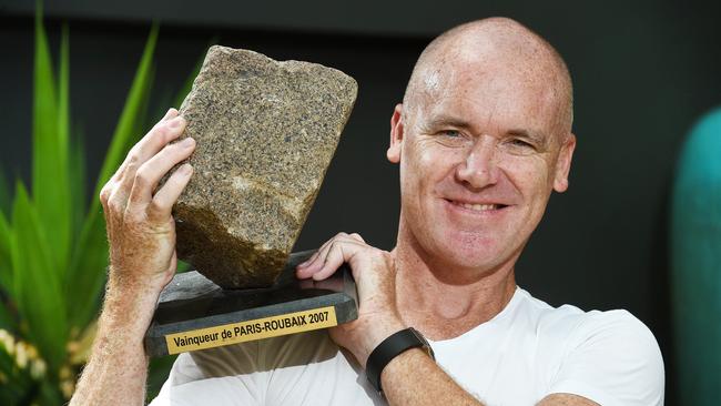 Stuart O'Grady at home with his 2007 Paris-Roubaix rock trophy. Picture Roger Wyman