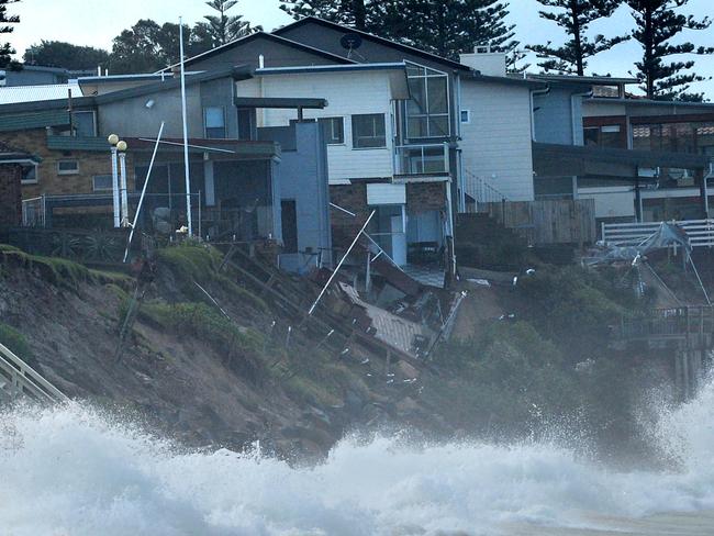 Large seas saw Wamberal beachfront homes partly collapse in July 2020. Picture: Jeremy Piper