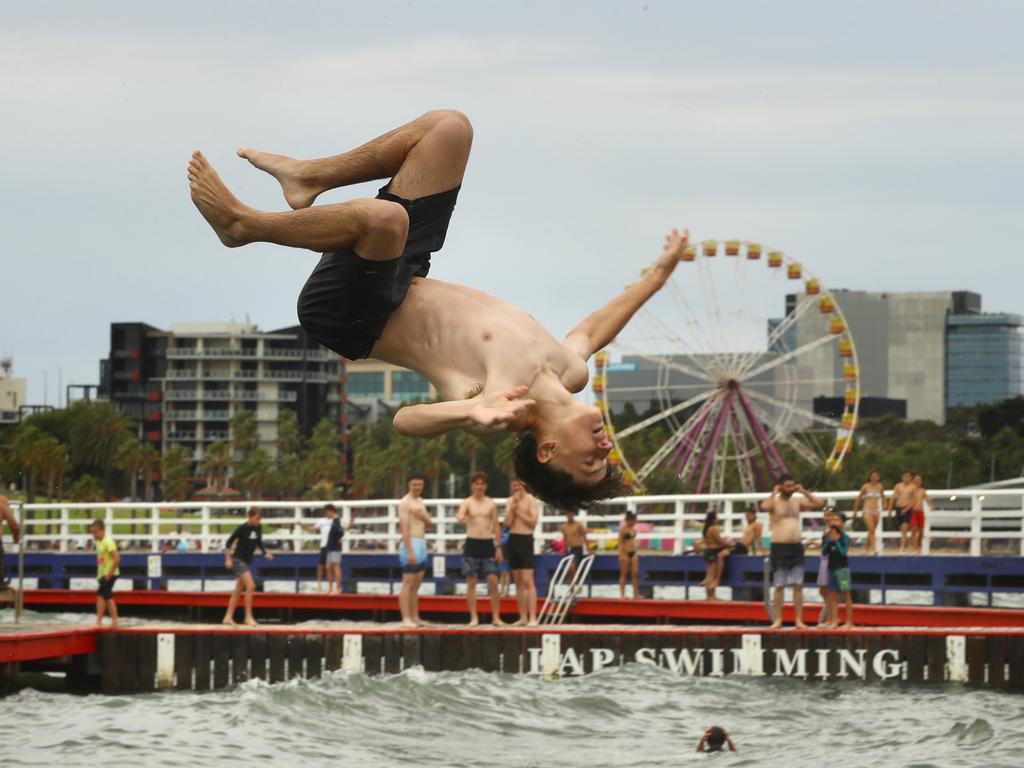 Beach goers cooling off on Boxing Day 2024 at Geelong's Waterfront. Picture: Alison Wynd