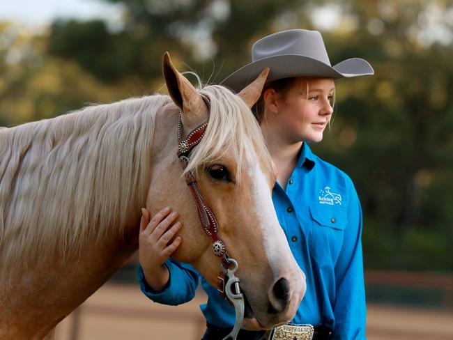 PENRITH PRESS/AAP. 14 year old champion equestrian rider Charlotte Callinan with her 11 year old gelding Wimpy at Mulgoa. Mulgoa, Thursday 09 May, 2019. Charlotte Callinan is a champion equestrian rider. (AAP IMAGE / Angelo Velardo)