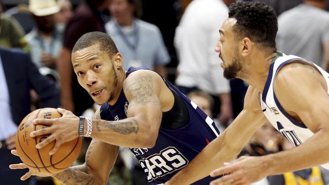 Adelaide 36ers guard Jerome Randle drives on Utah Jazz guard Nigel Williams-Goss. Picture: Scott G Winterton/The Deseret News via AP