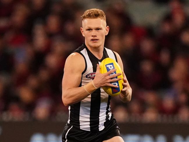 Adam Treloar in his Magpies days. Picture: AAP Image/Scott Barbour