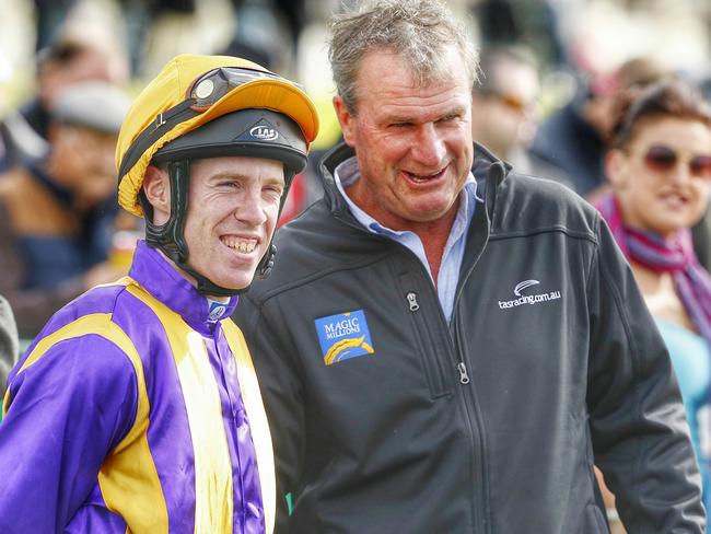 John Allen talks with trainer Darren Weir during their successful stint at the recent Warrnambool May Carnival. Picture: Colleen Petch.