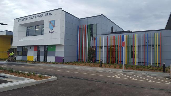 The finishing touches were being made last Thursday to the front of St Gregory's College Junior School before the students start arriving this week. Picture: Luisa Cogno