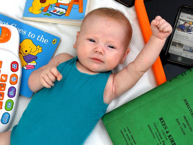 10 week old Finnlay Learman getting in some early study and wondering what the world of work will be like in 18 years.Thursday 18, 2021. Picture, John Gass