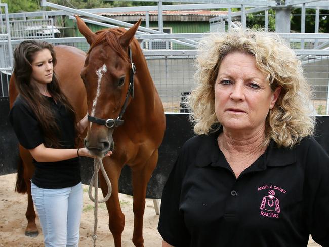 Horse Trainer Angela Davies and staff member Renee Miles at her Narara home that has been set up for training, including a recently bought $40,000 horse walker. She is furious at the impending closure of the training track at Gosford Race Club.