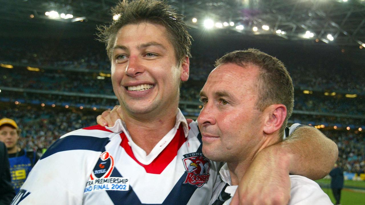 The Wests Tigers fans celebrate after victory in the NRL Grand