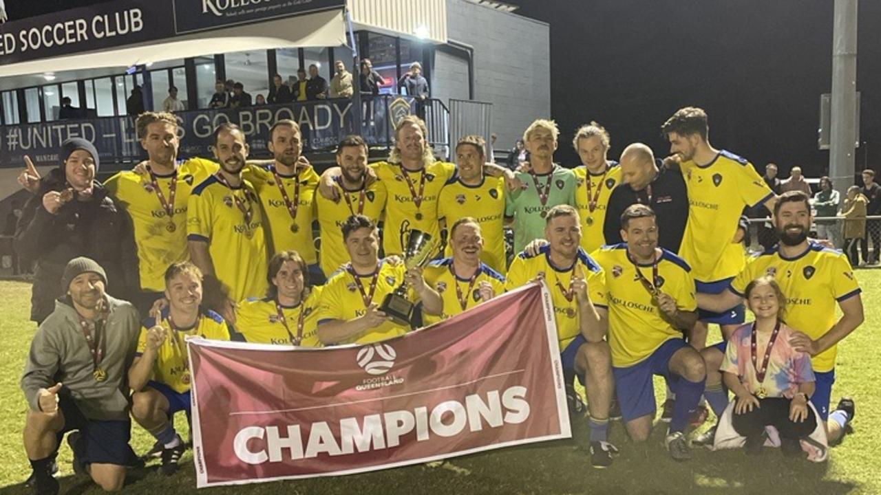 Broadbeach United celebrate their grand final win.