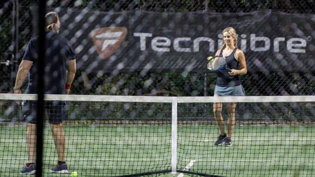 Russell Crowe enjoying a game of tennis with Britney Theriot in Paddington. Picture: Tim Pascoe