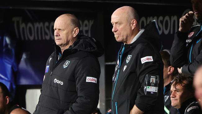 ADELAIDE, AUSTRALIA - MAY 02: Ken Hinkley, Senior Coach of the Power coaching from the bench during the 2024 AFL Round 08 match between the Adelaide Crows and the Port Adelaide Power at Adelaide Oval on May 02, 2024 in Adelaide, Australia. (Photo by Sarah Reed/AFL Photos via Getty Images)