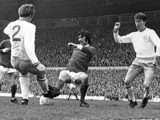 Manchester United winger George Best tries to get possession in 1969.