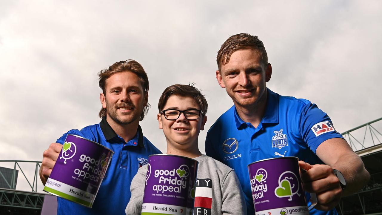 Western Bulldogs star Caleb Daniel and North Melbourne captain Jack Ziebell pose with Jai Waters (middle) ahead of the Good Friday Super Clash. Picture: Getty Images