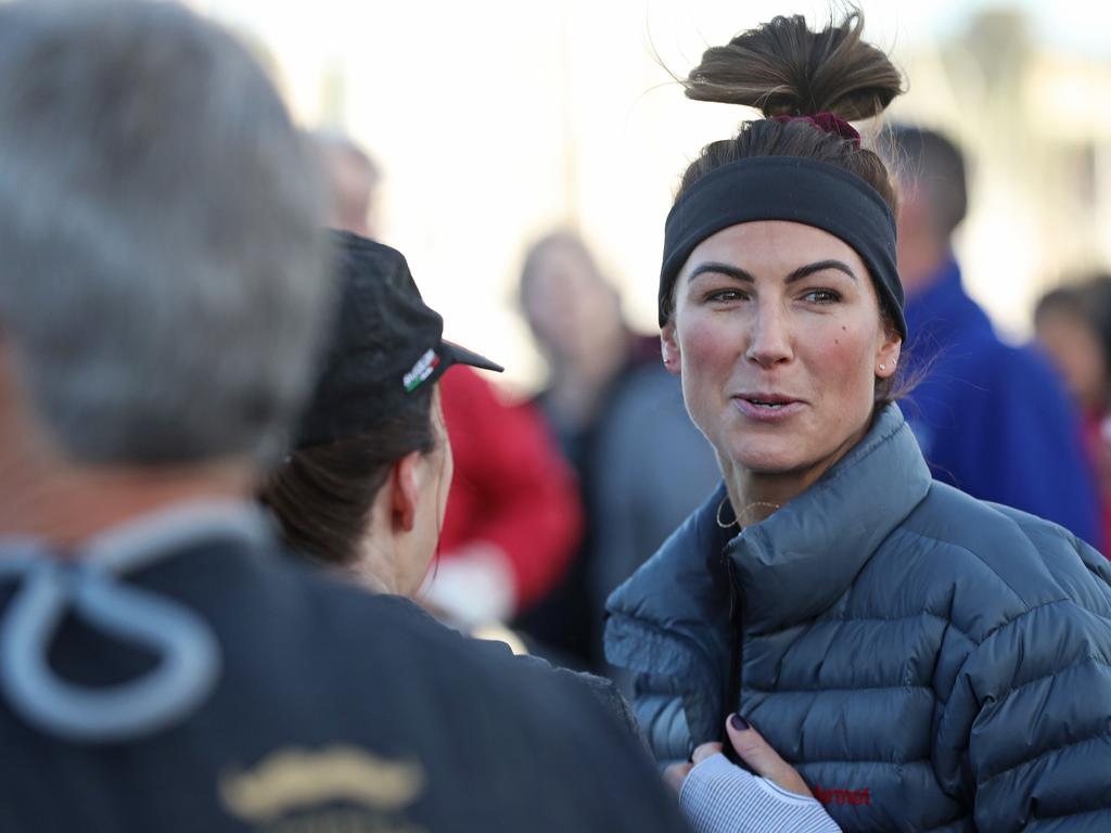 Sophie Burbury warms up before the 2019 Point to Pinnacle walk. Picture: LUKE BOWDEN