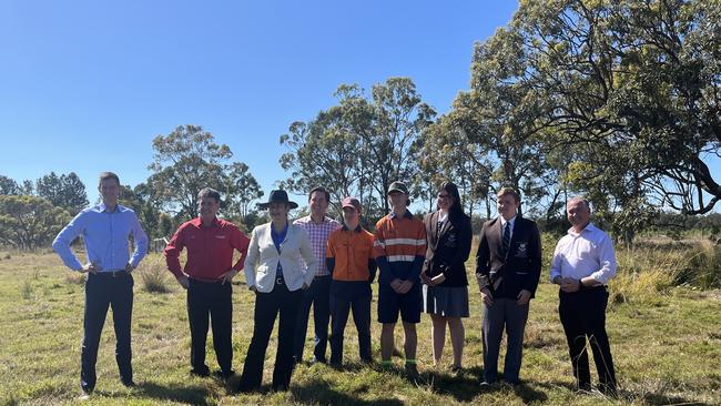 Premier Annastacia Palaszczuk with Maryborough MP Bruce Saunders, Transport Minister Mark Bailey, Hervey Bay MP Adrian Tantari and Fraser Coast Mayor George Seymour turn the sod at the site of the new $239 million Torbanlea train factory with the help of students from Maryborough State High School.