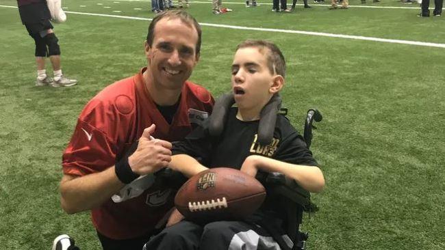 Luke meeting former New Orleans Saints quarterback Drew Brees. Picture: Team Luke